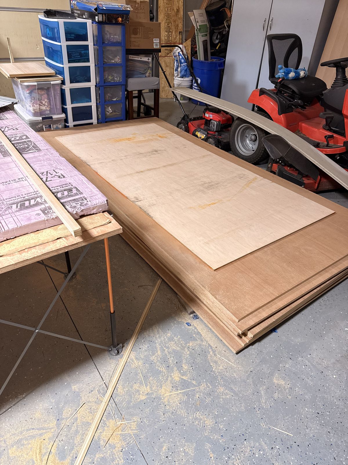 Full sheet of rift sawn white oak plywood on the Bora Centipede workstation in the garage ready for track saw breakdown