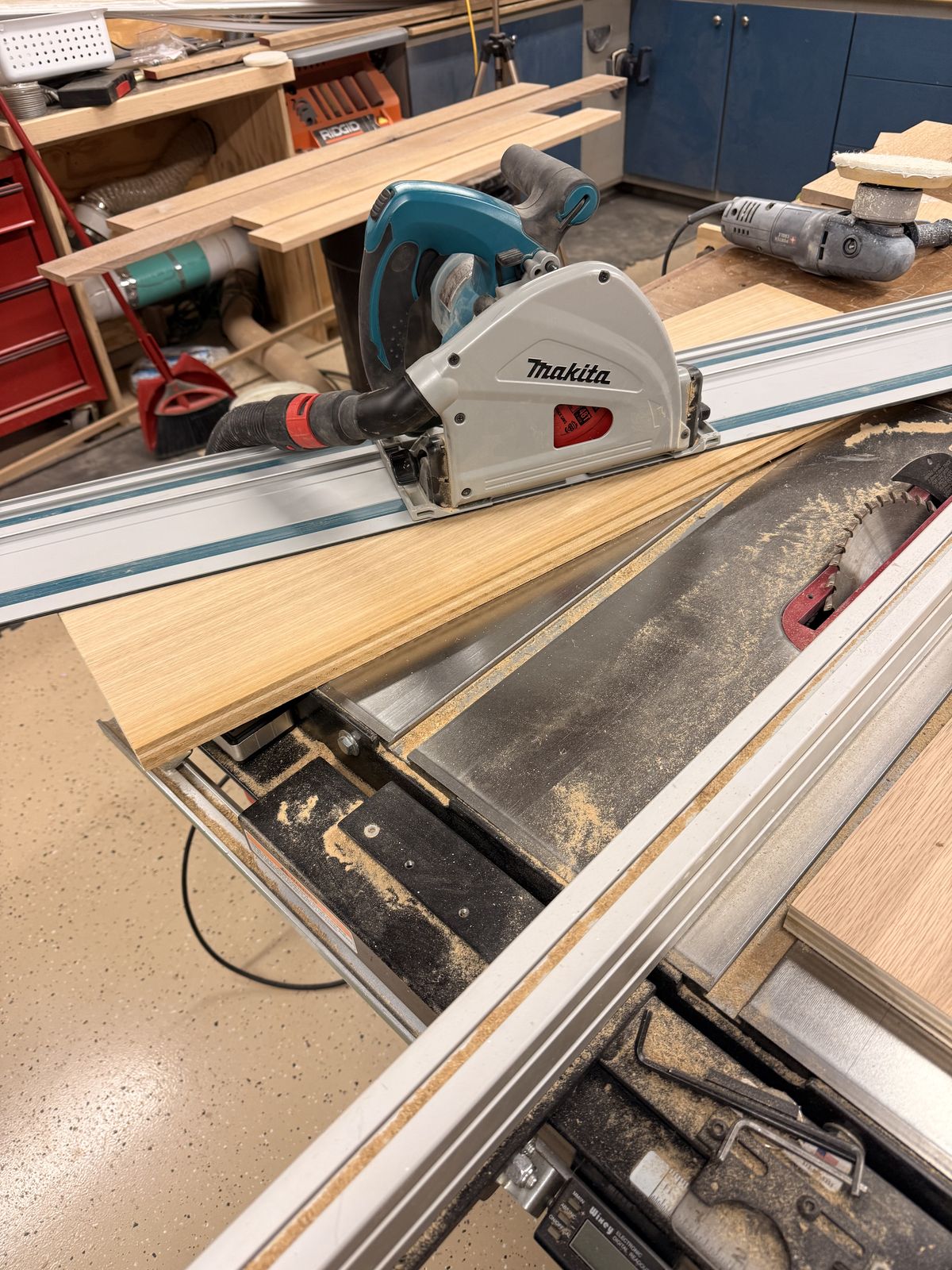 The Makita sitting on the Grizzly table saw ready for the next rip cut