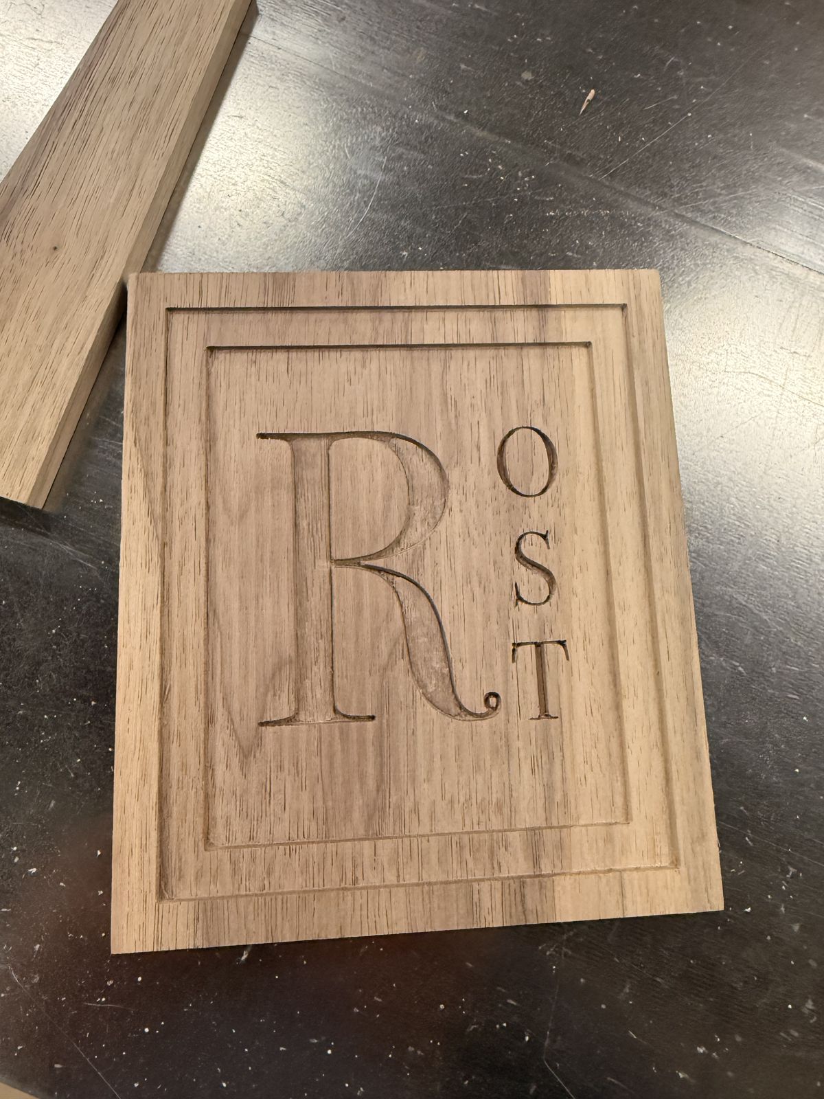 An engraved panel before assembly